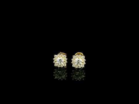 Diamond halo stud earrings in 18K yellow gold with round centre diamonds surrounded by smaller round diamonds.