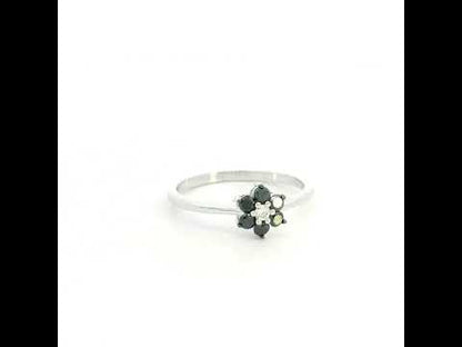 Black diamond flower ring in 18K white gold with black diamond petals and white diamond centre