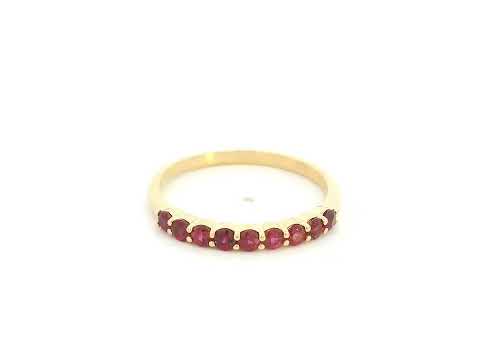Ruby band ring in 18K yellow gold with natural ruby gemstones