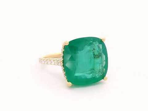 9.01 carat cushion-cut emerald ring in 18K yellow gold with hidden halo and diamond pavé band