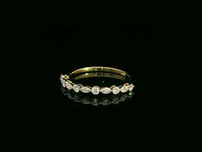18K yellow gold diamond band featuring alternating marquise and round diamonds – elegant stackable fine jewelry by Emirates Diamonds.