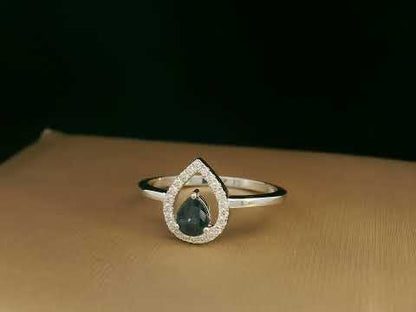 18k White Gold, Pear Shape Blue Sapphire & Diamond Halo Ring