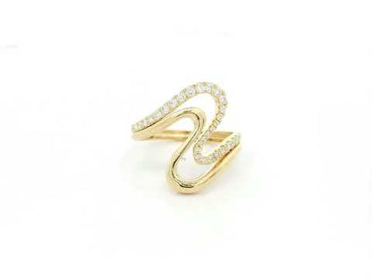 Diamond statement ring with sculptural design in 18K yellow gold by Emirates Diamonds