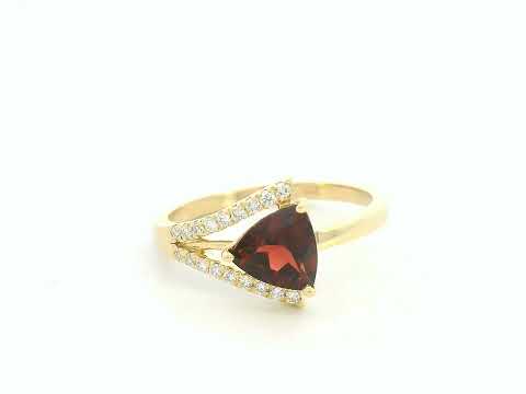 18K yellow gold triangular garnet ring with split-shank pavé diamonds, modern luxury design
