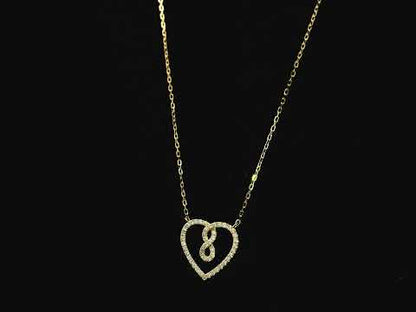 Diamond infinity heart pendant necklace in 18K yellow gold by Emirates Diamonds