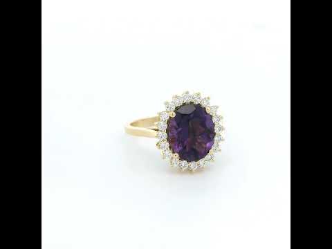 Oval amethyst and diamond halo ring in 18K yellow gold
