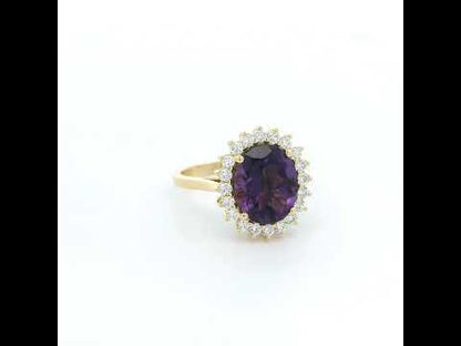 Oval amethyst and diamond halo ring in 18K yellow gold