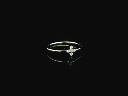 Dainty diamond floral cluster ring in 18K white gold minimal design