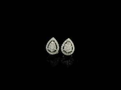 18K white gold diamond stud earrings featuring a pear-shaped cluster of natural diamonds surrounded by a sparkling diamond halo.