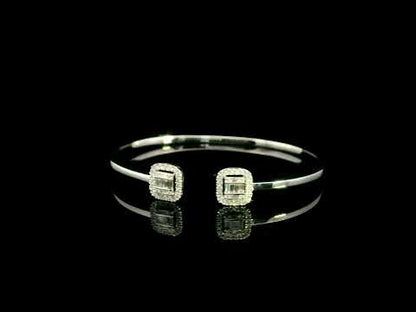 18K white gold open diamond bangle with round brilliant and baguette cut diamonds in matching square geometric ends