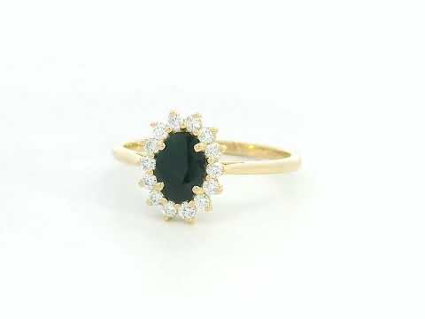 18K yellow gold oval sapphire ring with diamond halo, classic sapphire and diamond ring by Emirates Diamonds