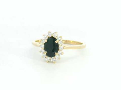 18K yellow gold oval sapphire ring with diamond halo, classic sapphire and diamond ring by Emirates Diamonds