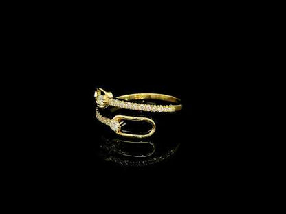 Diamond open bypass ring in 18K yellow gold with round diamonds, sweeping diamond-set curves and polished gold loops.