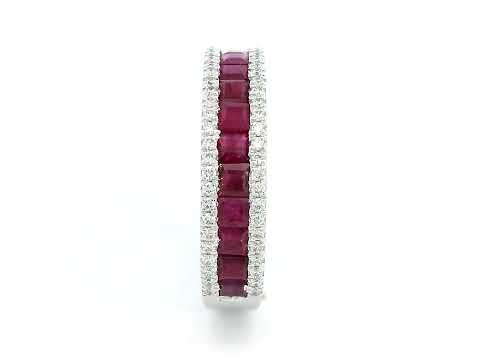 18K gold ruby and diamond ring with 1.36ct baguette-cut rubies and 0.26ct round diamonds in modern channel setting.