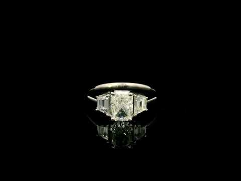 18K white gold radiant cut diamond engagement ring with a 1.51 carat HRD certified centre diamond and trapezoid side diamonds.