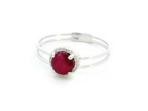 1.14 carat ruby and 0.05 carat diamond halo ring in 18K white gold with a modern double-band design.
