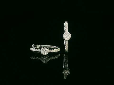 Diamond huggie hoop earrings in 18K gold with  round diamond cluster