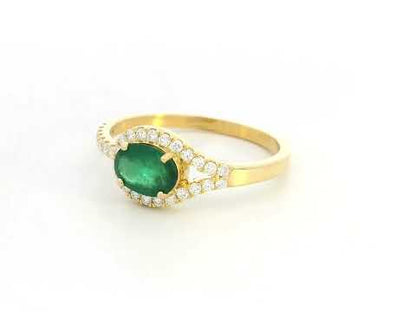 Emerald & Diamond Halo Ring in 18K Yellow Gold