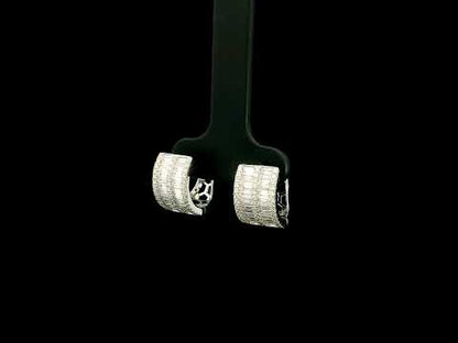 18K white gold baguette and round diamond huggie hoop earrings with multi-row diamond design
