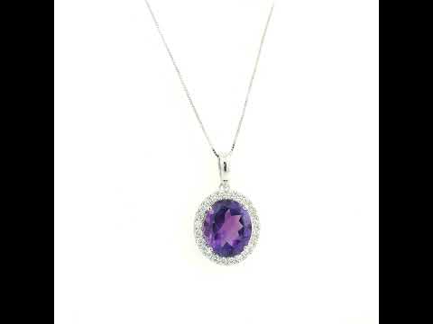18K white gold amethyst and diamond halo pendant with oval purple gemstone