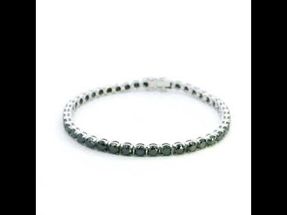 Black diamond tennis bracelet in 18K white gold with a continuous single row of round black diamonds