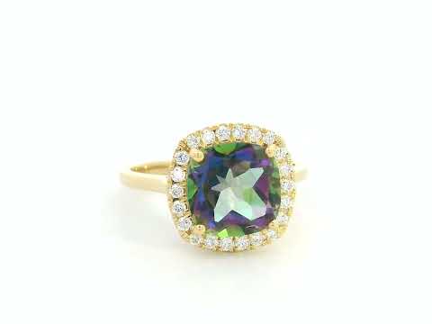 18K yellow gold ring featuring a 2.96 carat Mystic Quartz with diamond halo by Emirates Diamonds