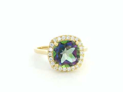 18K yellow gold ring featuring a 2.96 carat Mystic Quartz with diamond halo by Emirates Diamonds