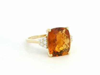 18K yellow gold cushion-cut citrine and diamond ring featuring a 4.37 carat citrine and 0.16 carat total diamond weight by Emirates Diamonds