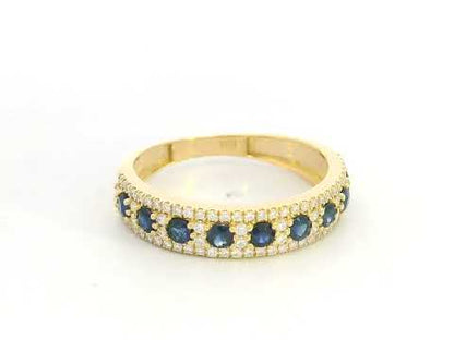 Blue sapphire and diamond band ring in 18K yellow gold by Emirates Diamonds