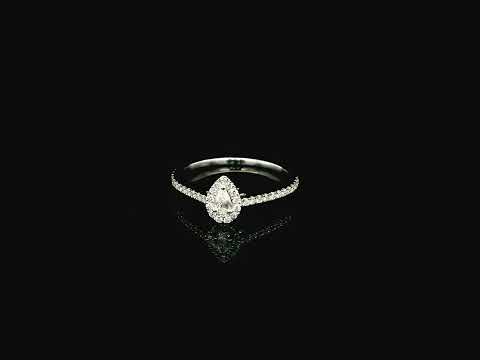 Natural pear shape diamond halo ring in solid 18K white gold featuring a pear-shaped centre diamond with a round brilliant diamond halo and pavé diamond band.