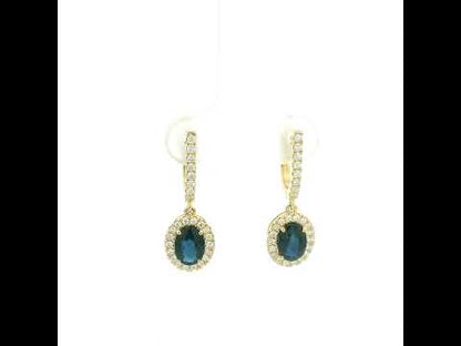 Oval blue sapphire and diamond halo drop earrings in 18K yellow gold with diamond-set hoops
