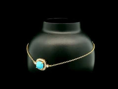 18K yellow gold turquoise and diamond bracelet with cushion-shaped turquoise cabochon, diamond halo and diamond side accents