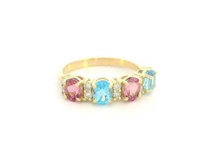 18K yellow gold band with alternating oval pink and blue sapphires and round diamond accents