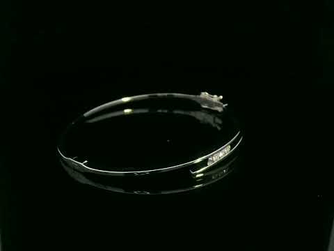 0.25 carat diamond bypass bangle in 18K white gold by Emirates Diamonds featuring floating round brilliant diamonds.