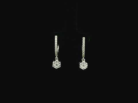 Diamond drop hoop earrings in 18K white gold featuring 0.59 carats of diamonds by Emirates Diamonds.