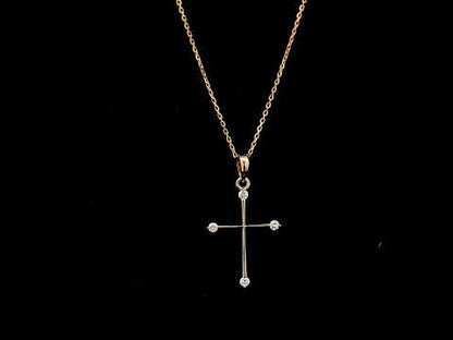 18K rose gold minimalist natural diamond cross pendant with four round brilliant diamonds.