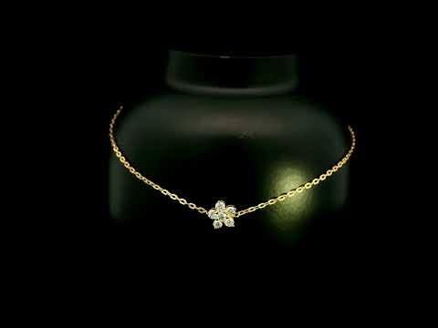 Diamond flower bracelet in 18K yellow gold featuring round brilliant diamonds arranged in a floral centre motif on a fine gold chain.