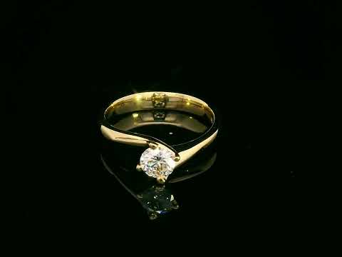 18K yellow gold twist band ring with a 0.47-carat round diamond."