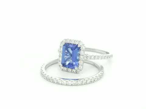 18K white gold tanzanite and diamond bridal ring set with halo engagement ring and diamond wedding band by Emirates Diamonds