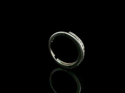 18K white gold channel set diamond wedding band featuring 0.36 carat natural round brilliant diamonds in a sleek polished stackable ring design.