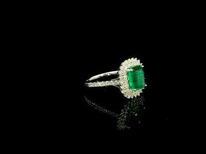 Emerald and Diamond Halo Ring in 18K White Gold