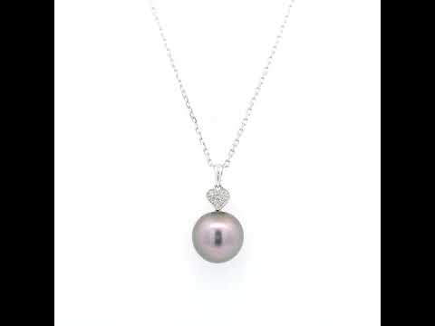 Tahitian black pearl diamond heart pendant in 18K white gold with natural diamond accent.