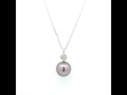 Tahitian black pearl diamond heart pendant in 18K white gold with natural diamond accent.