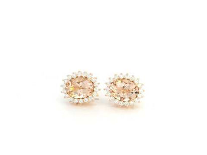 2.28 carat oval morganite and 0.36 carat diamond halo stud earrings in 18K rose gold by Emirates Diamonds