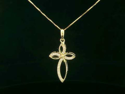 Elegant 18K gold cross pendant with pavé-set diamonds, featuring marquise-shaped curves and 0.10 carat diamond accents.