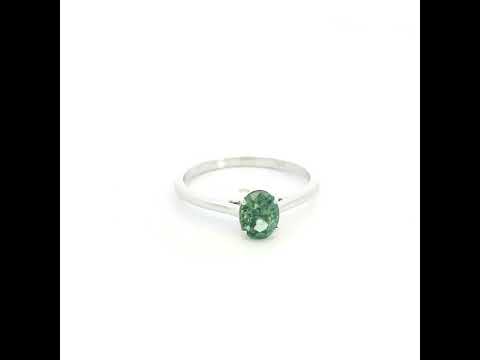 Oval green sapphire solitaire ring in 18K white gold with 1.11 carat natural green sapphire