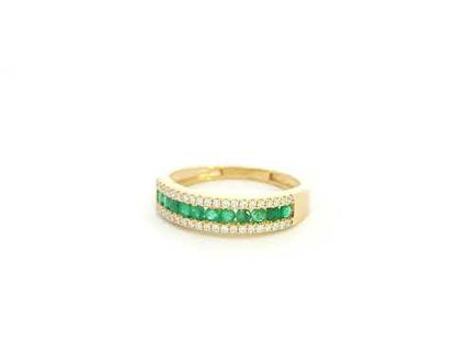 Emerald and diamond band ring in 18K yellow gold with channel set design by Emirates Diamonds