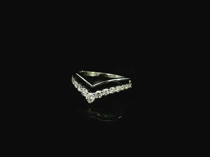 18K white gold graduated chevron diamond ring featuring 0.57 carats of natural diamonds in a V-shaped contour design, perfect as a wedding band, stack ring, or engagement ring enhancer.