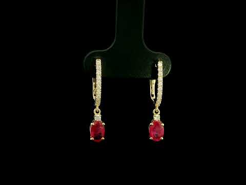 Ruby and diamond drop earrings in 18K yellow gold with oval ruby drops and diamond set hoops