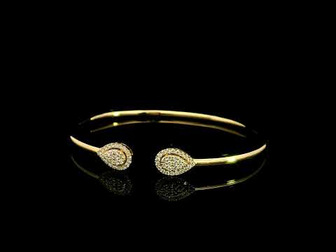 18K yellow gold open diamond bangle with twin pear-shaped diamond cluster ends.